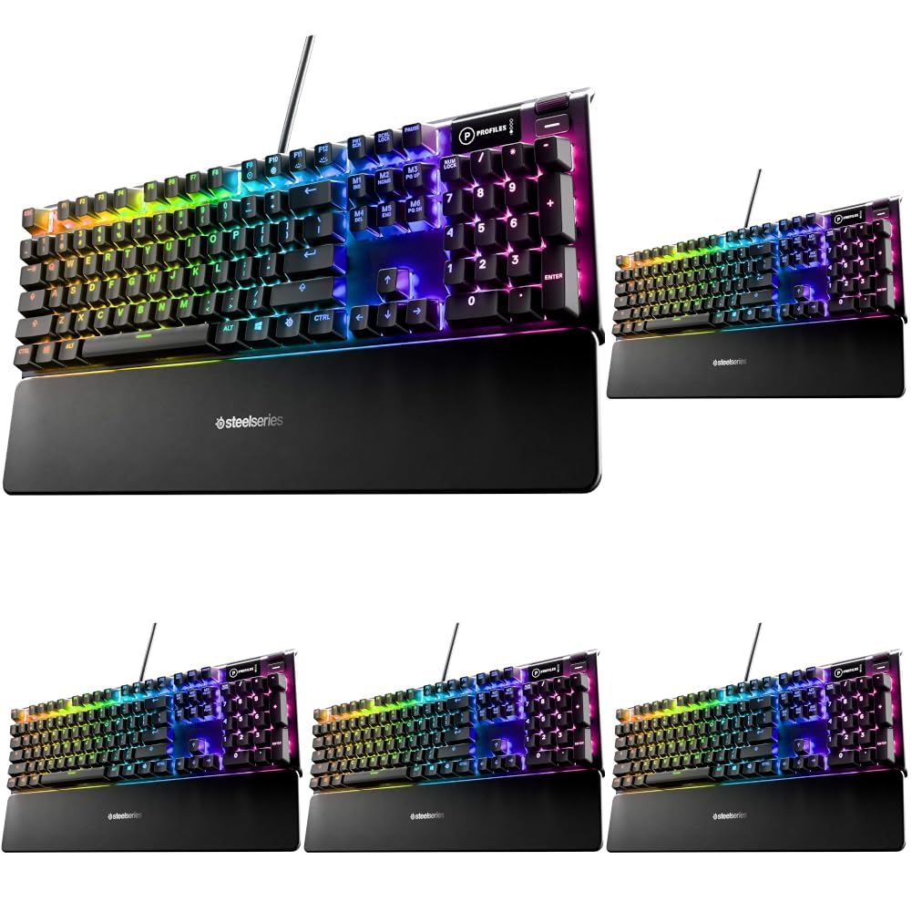 Dedicated multimedia controls on a SteelSeries RGB gaming keyboard with wrist rest.