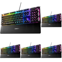 Dedicated multimedia controls on a SteelSeries RGB gaming keyboard with wrist rest.