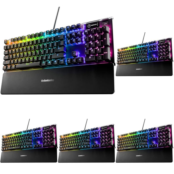 Dedicated multimedia controls on a SteelSeries RGB gaming keyboard with wrist rest.