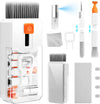 Keyboard cleaning kit tools including keycap puller and brush for effective cleaning of laptop and computer keyboards.
